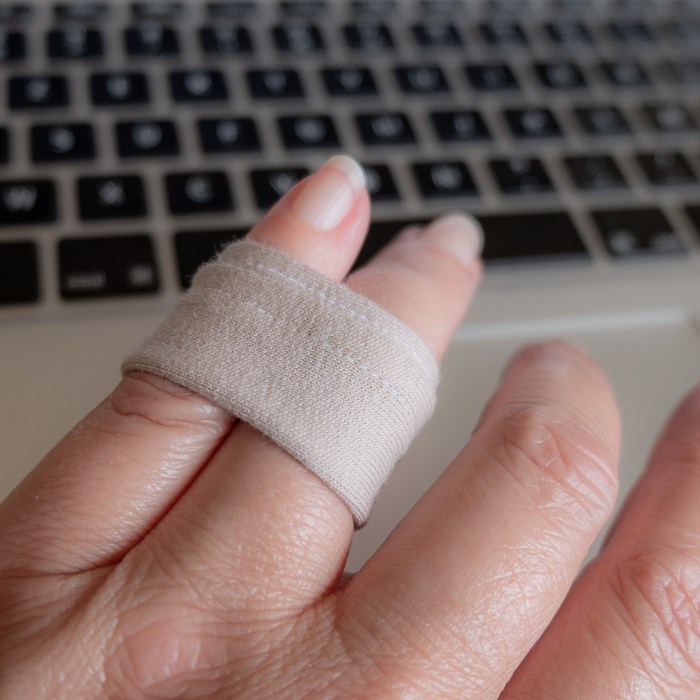 Programmer's RSI - reusable buddy taping devise